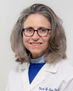 Dr. Marti Rothe portrait, white coat