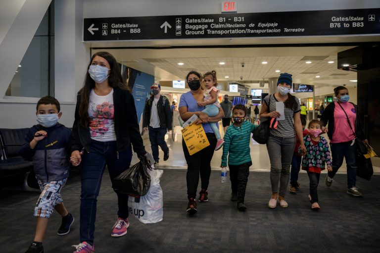 Asylum seekers from El Salvador and Honduras arrive in the US. The number of refugees permitted entry into the US shrank to new lows under the Trump administration. (Photo by ED JONES/AFP via Getty Images)
