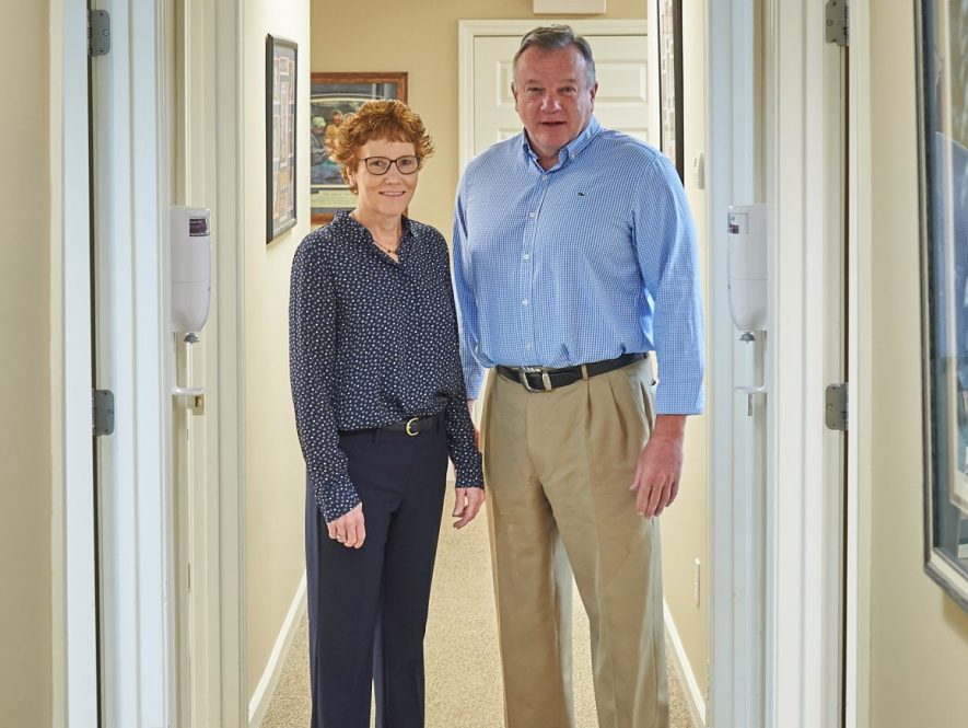Drs. Karla and Michael Scanlon in their medical office