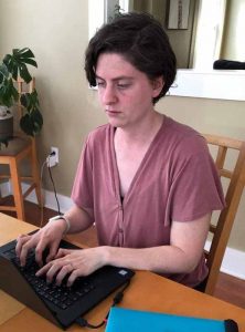 a woman at a laptop