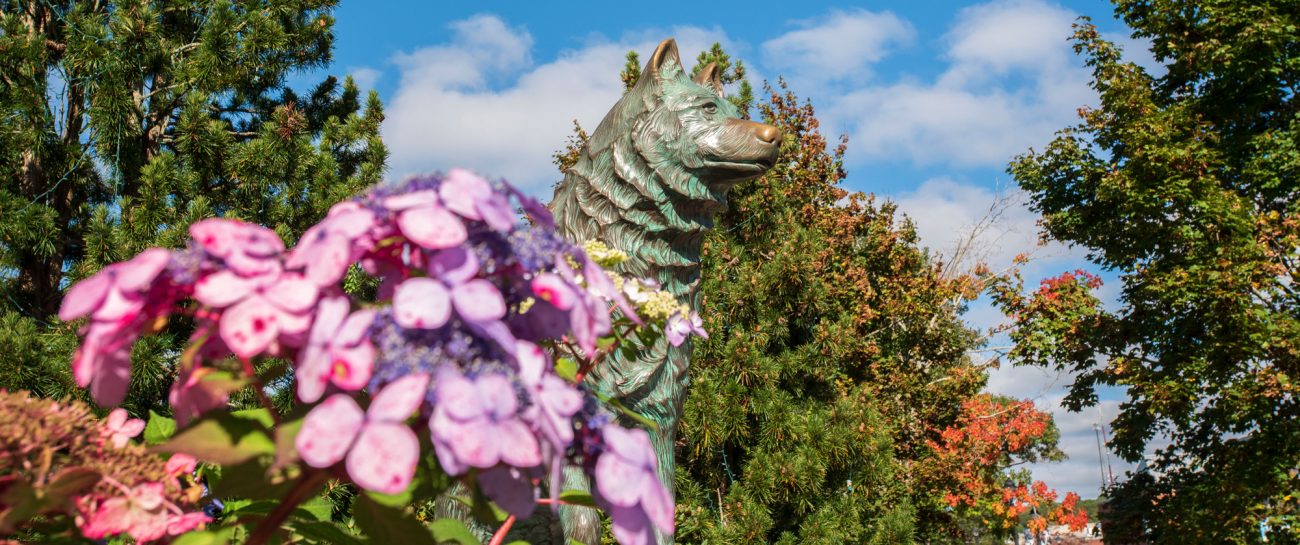 Jonathan statue in spring with flowers