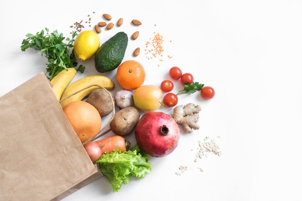 A grocery bag full of fruits and vegetables. Food pantry clients have said they want more healthy options, according to new research.