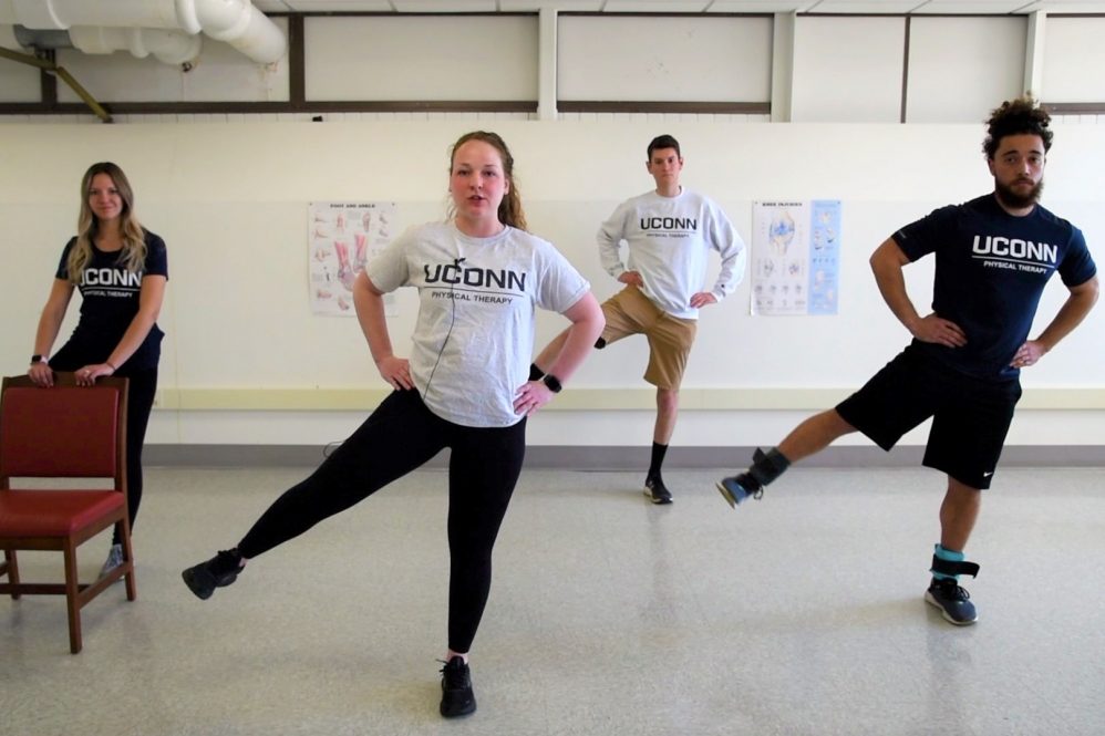 Four students doing exercises
