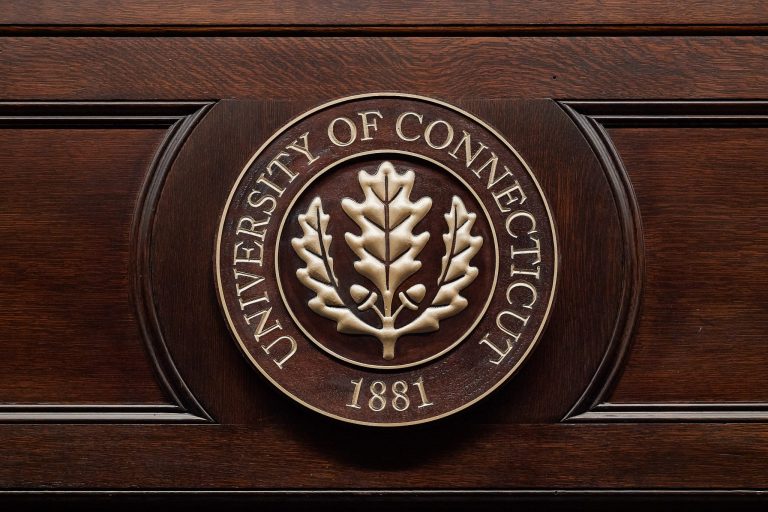 The oak leaf seal of the University of Connecticut.