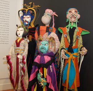 A display of several rod puppets created by Frank Ballard, UConn’s first head of Puppet Arts, for his production of “The Mikado."