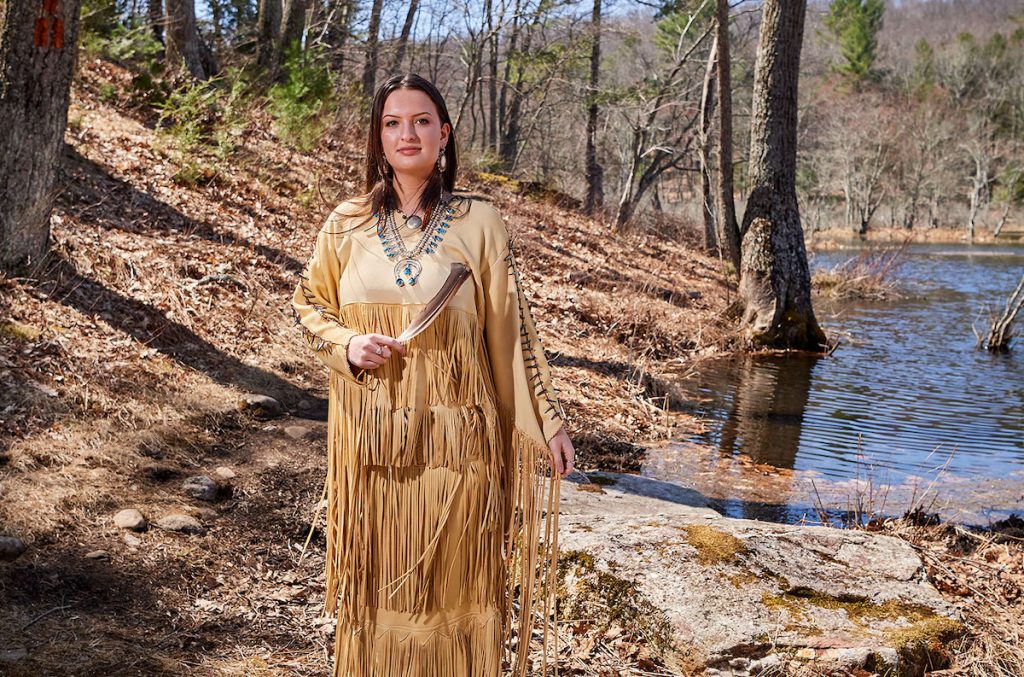 Phillips in her regalia in the UConn Forest.