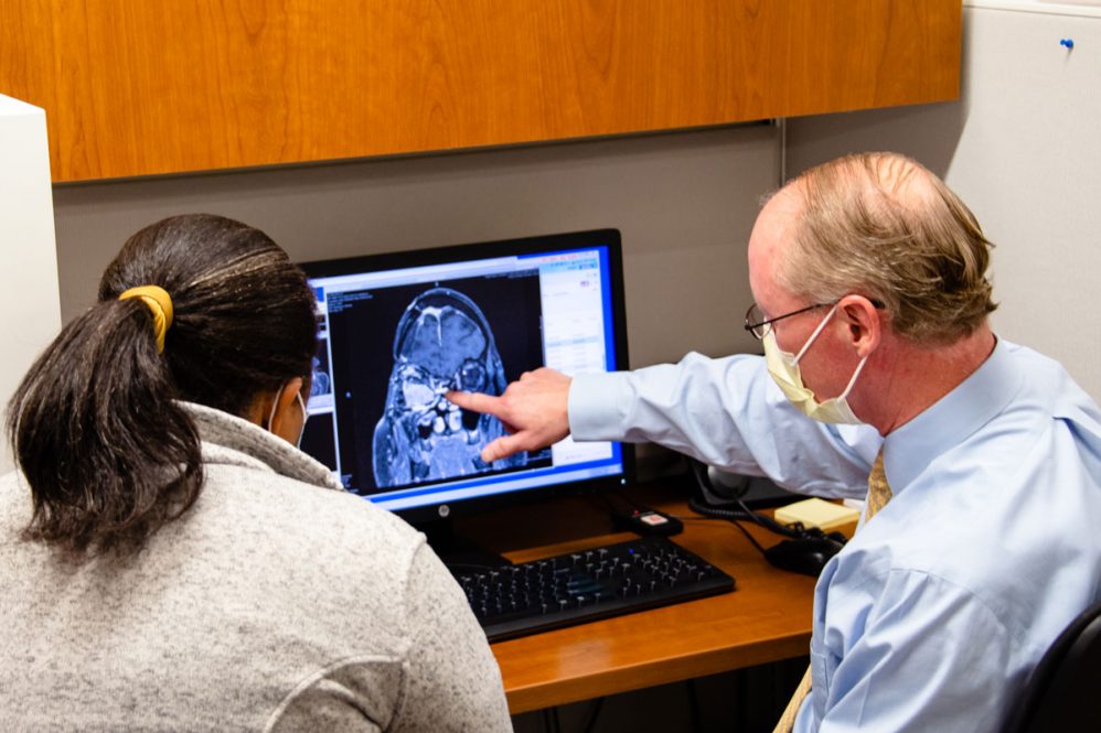 Dr. Kevin Becker explains a brain image