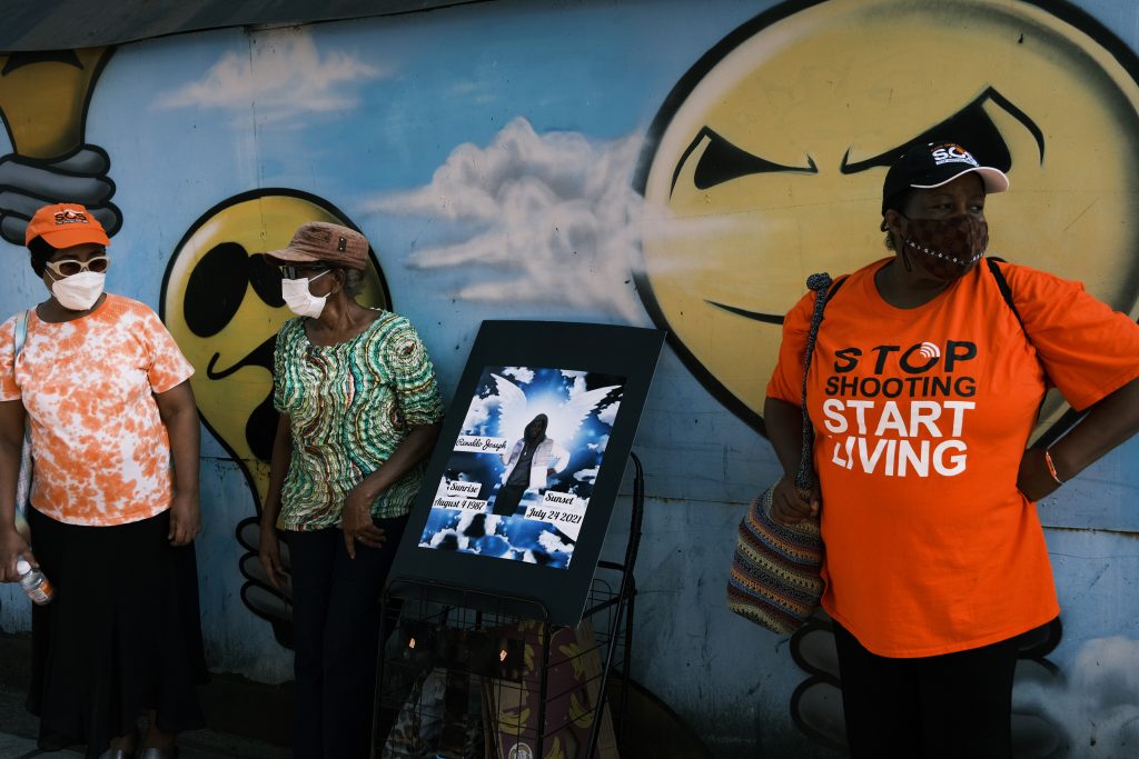 Residents and community activists gather in a Brooklyn neighborhood to remember the life of Renaldo Joeseph on July 27, 2021 in New York City. Joeseph was killed by a gunshot on a residential street last weekend, one of over 200 people shot in New York City so far in 2021. Gun crime is on the rise in many American cities promoting concern among residents and politicians.