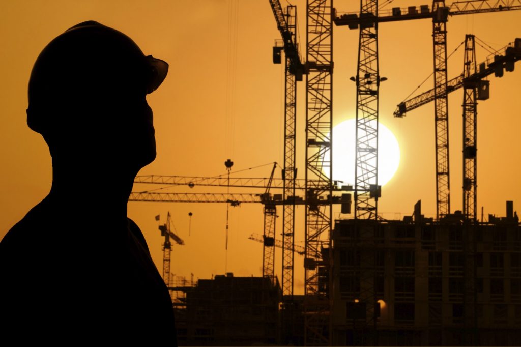 Shadow of construction worker/site