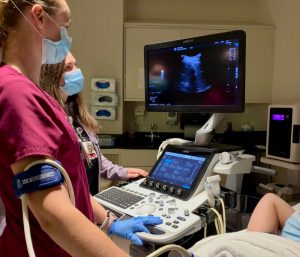 Sonographers perform abdominal ultrasound