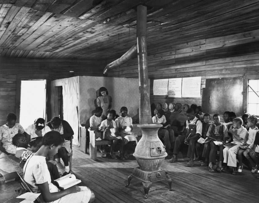 A one-room segregated schoolhouse in Georgia in 1941. Funding disparities that date from the Jim Crow era still affect predominantly Black schools today.