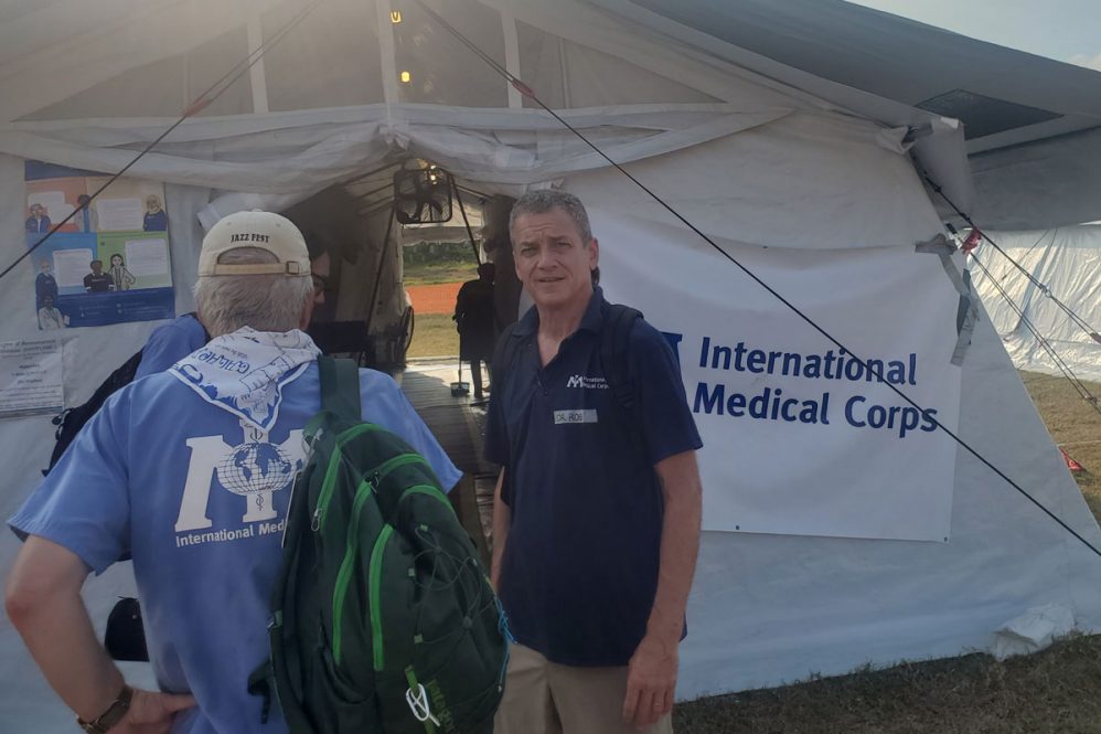 Dr. Fuller outside an International Medical Corps medical tent