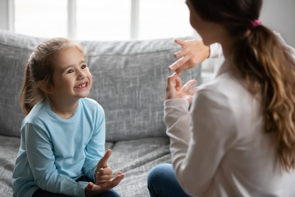 Introduction to sign language at a young age helps children who are deaf or hard of hearing develop more quickly, according to new research.