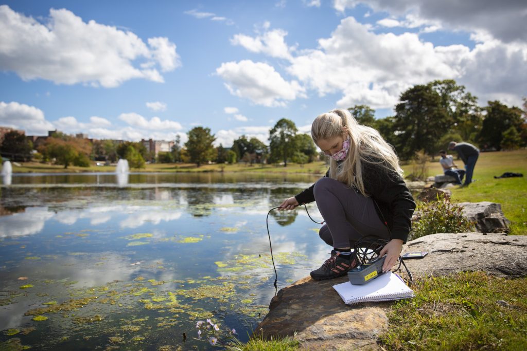 Students measure physiochemical conditions in Mirror Lake during a section of GSCI 4130: Geomicrobiology, taught by marine science and geosciences professor Pieter Visscher, on October 6, 2020. 