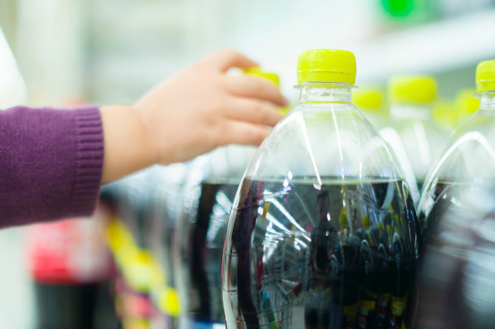 Ads for sweetened drinks that target children and families have an impact on households' buying habits, according to new research.