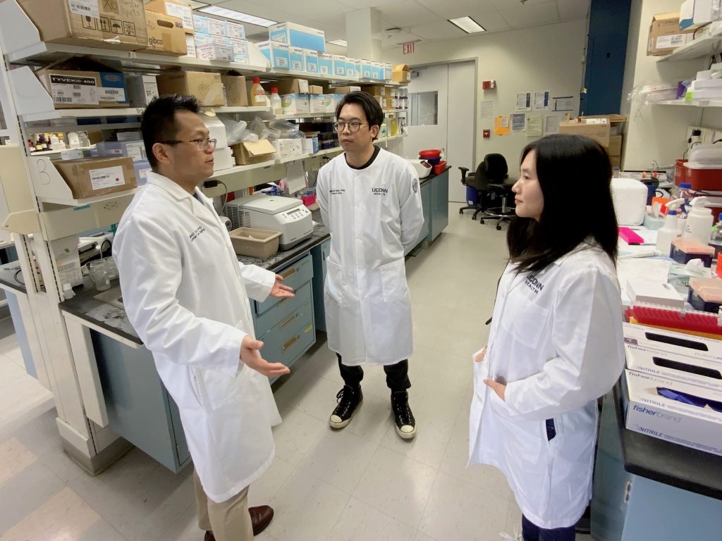 UConn Health School of Medicine researchers Ming Xu, Binsheng Wang, and Lichao Wang.