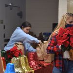 Students at the poinsettia sale