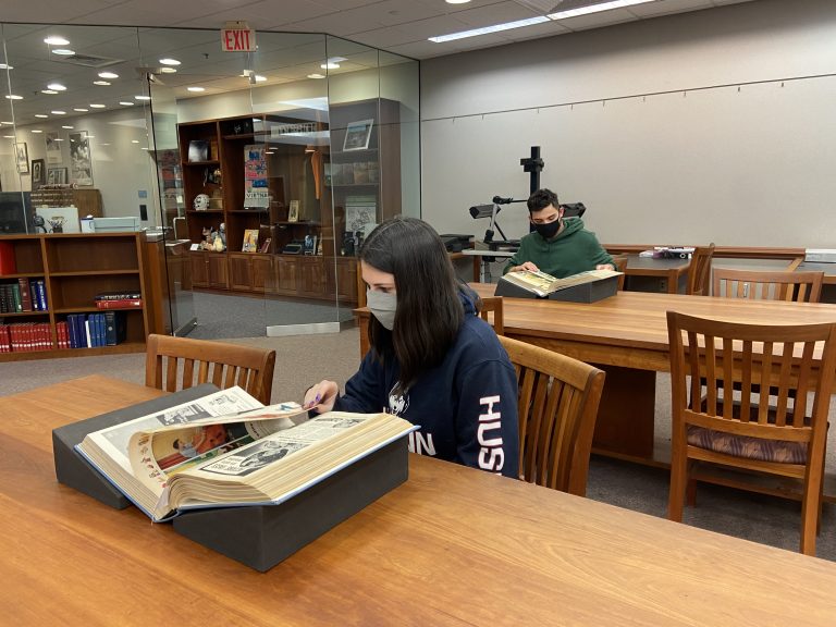 Students working materials found in the Dodd Papers, which are maintained by the UConn Library’s Archives and Special Collections.