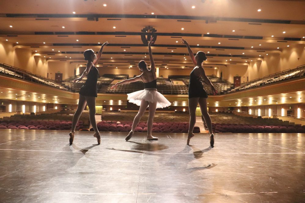Angelia Prip '22, center, and two other dancers from the University Ballet Co. rehearse ahead of their inaugural performance.