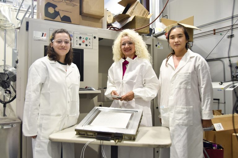 Incoming Interim UConn President Radenka Maric in her lab with graduate research assistant Alanna Gado, left, and Ph.D. student Jiale Xing (Peter Morenus / UConn Photo).
