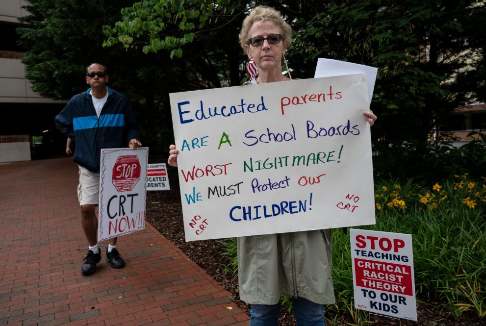 Protesters outside a school board meeting in Virginia in June 2021 (Photo by Andrew Caballero-Reynolds/AFP via Getty Images).
