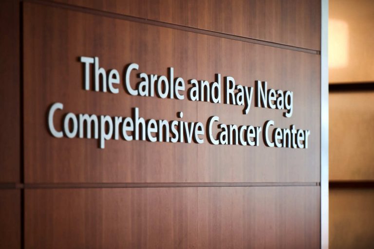 A sign for The Carole and Ray Neag Comprehensive Cancer Center at UConn Health in Farmington