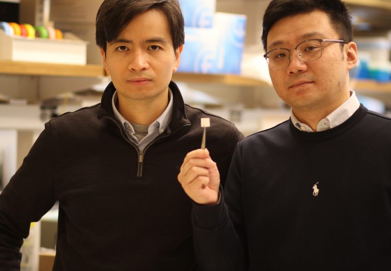 UConn researchers Thanh Nguyen, left, and Yang Liu, with the tissue scaffold made out of a biodegradable polymer that they say holds promise for treating ailments like arthritis.