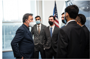 Gov. Ned Lamont speaks with the UConn graduate students who bested nearly 500 other teams in the Bloomberg Global Trading Challenge (UConn School of Business Photo).
