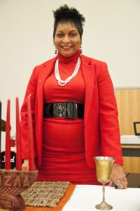 Dr. Willena Kimpson Price in red suit.