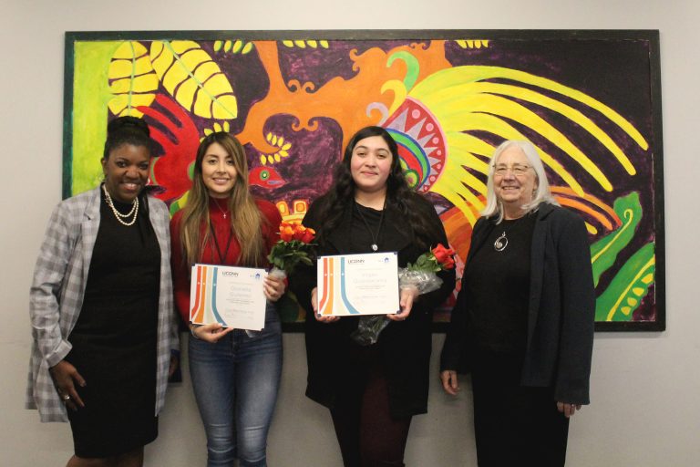 DCF Commissioner Vannessa Dorantes, Gianella Gutierrez BSW 22, Virgen Guadarrama BSW 22, and School of Social Work Dean Nina Rovinelli Heller. The students delivered their poster presentations this spring at DCF.