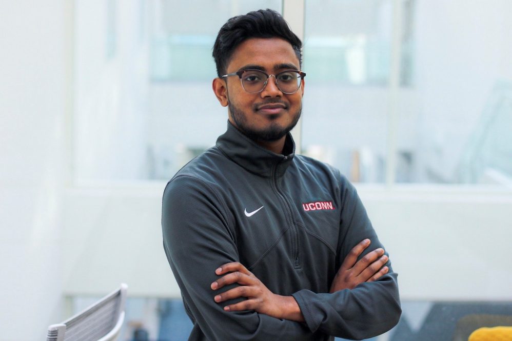 Photo of Reaj Uddin in a UConn pullover