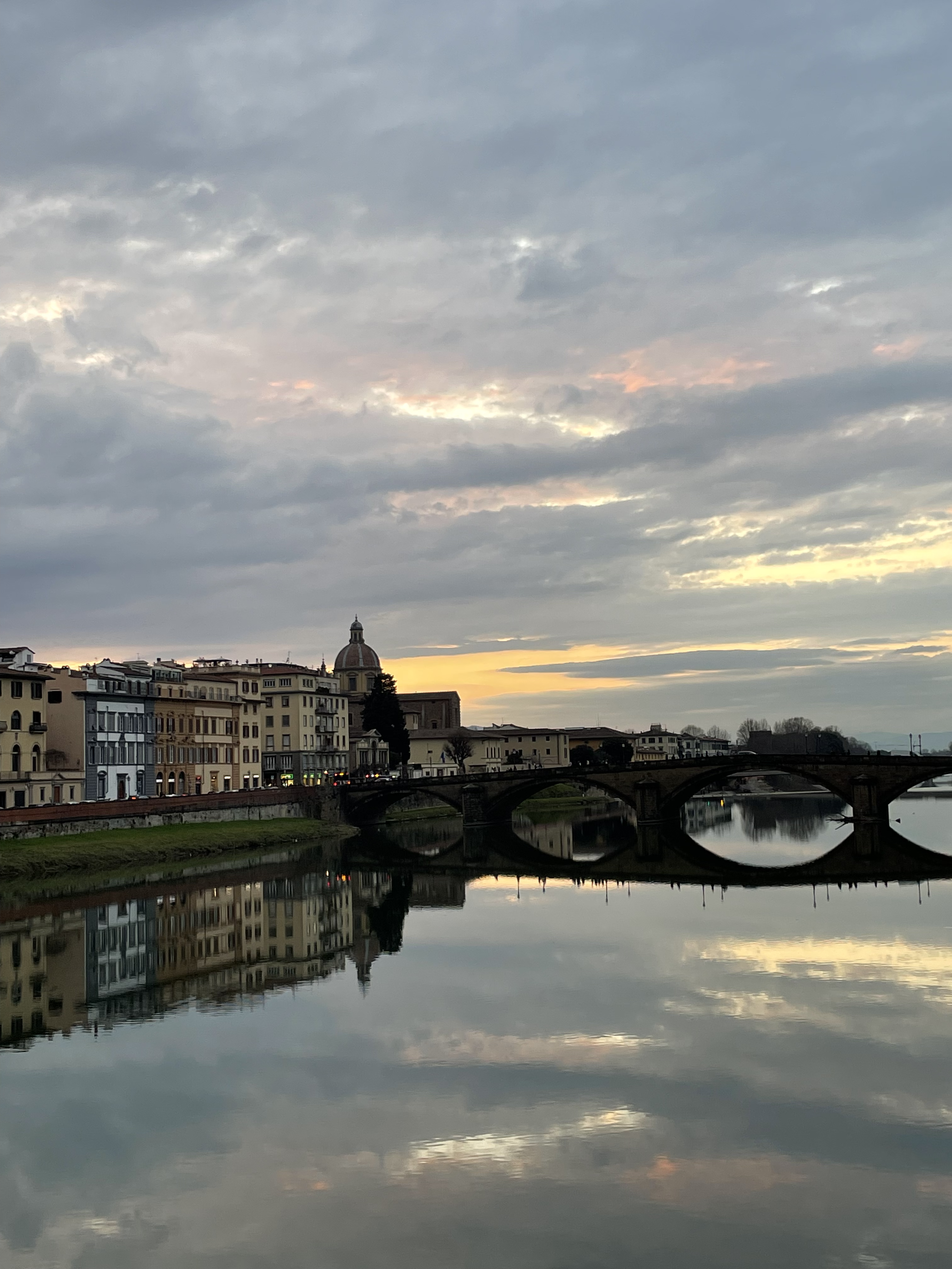 "Sunset over the Arno in Florence" by Shayna Martin