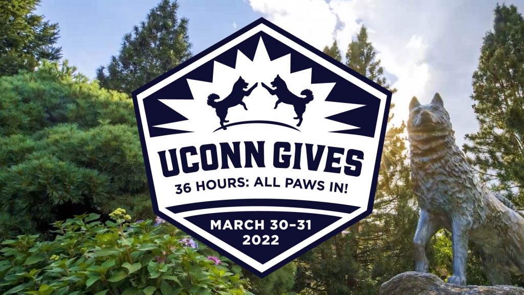 A UConn Gives campaign logo on top of a photo of the jonathan statue on campus.