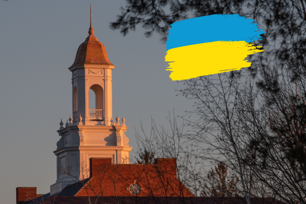Sunset photo of wilbur cross with a Ukrainian flag