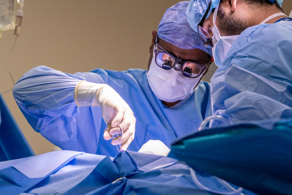 Dr. Kwame S. Amankwah, Chief of Vascular and Endovascular Surgery performing a bypass surgery.