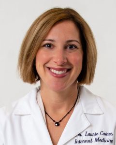Dr. Laurie Caines portrait, white coat