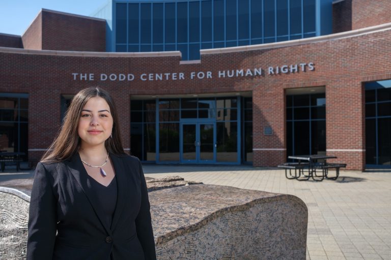 Samantha Gove '23 (CLAS) stands outside The Dodd Center for Human Rights on May 5, 2022.