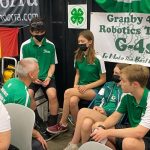 UConn 4-H Volunteer meets with members of the Granby 4-H VEX Robotics (Contributed photo)
