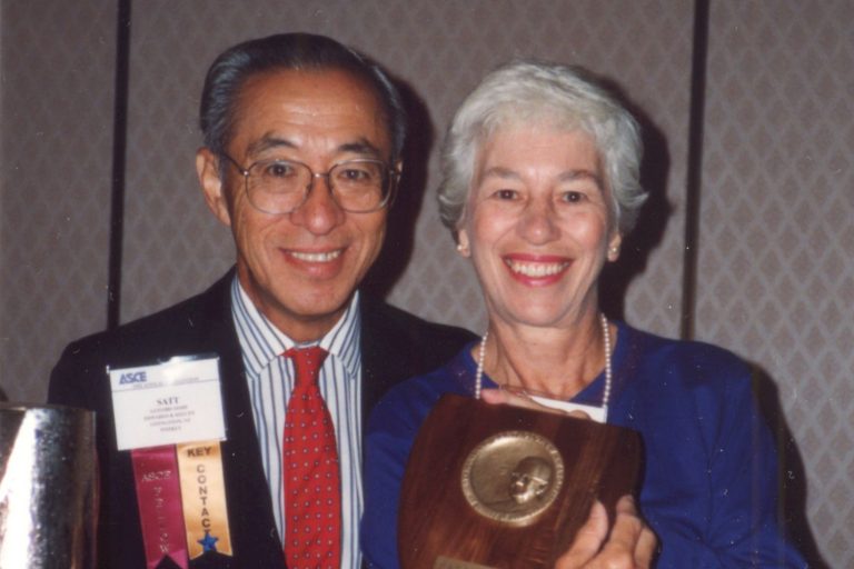 Satoshi and Jeanette Oishi at award ceremony.