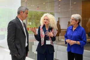 Radenka Maric, center, interim president, speaks with U.S. Secretary of Energy Jennifer Granholm, right, and George Bollas, director, institute for advanced systems engineering, on a visit to the Innovation Partnership Building