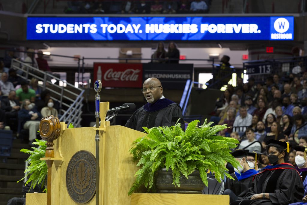 Richard A. Robinson ‘79 (CLAS) at podium during commencement