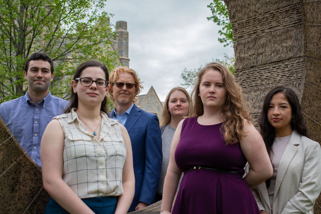 Caption: Participants in the Hate Crimes Practicum included Luke Reynolds '22, Rebecca Oestreicher '23, Associate Dean Richard Wilson, Hallie Tingstad '22, Devon Fray '22 and Laura David '22. (Molly Sullivan photo)