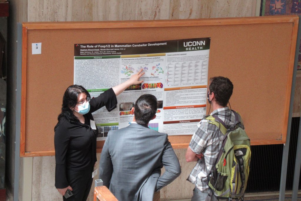 Student presenting poster