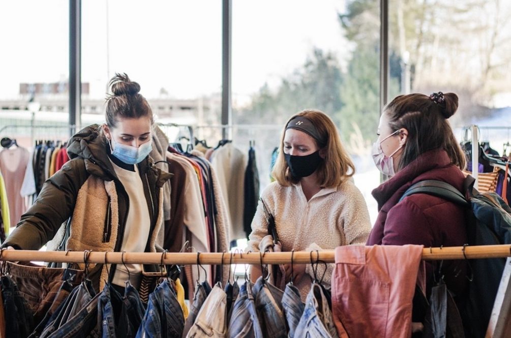 Students browse articles of clothing in UConn's new Swap Shop