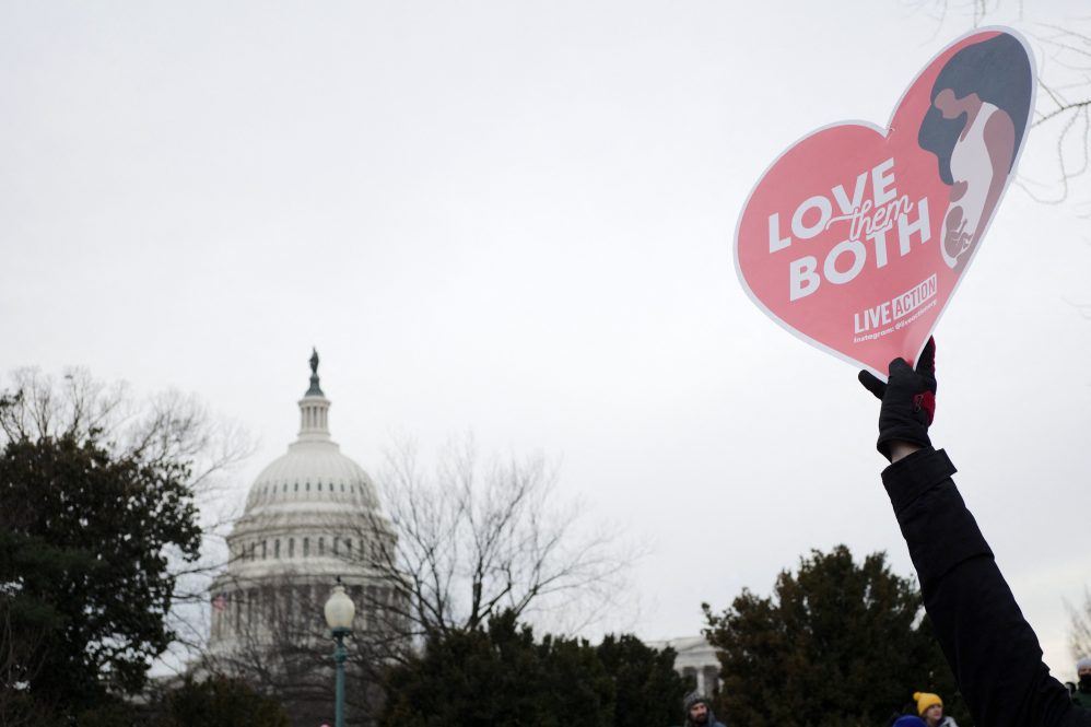 Pro-life activists march during the 49th annual March for Life, on January 21, 2022, in Washington, DC.