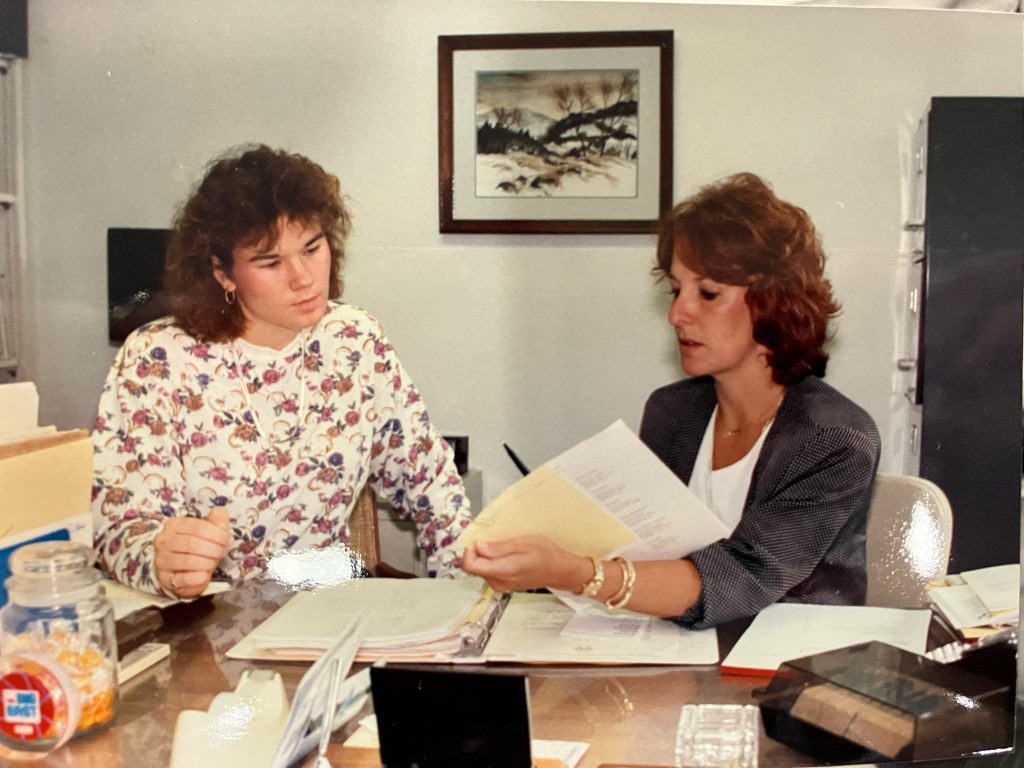 Pat Meiser, right, in an undated photo, during her time as associate athletic director for administration at UConn.
