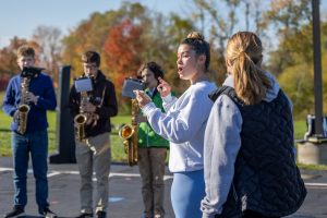 Students from the Stonington High School marching band rehearse with members of the UConn marching band during one of UCMB’s high school band clinics