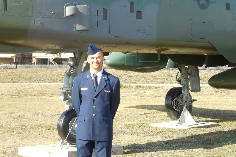 Jordan Dean in uniform in front of Air Force plane