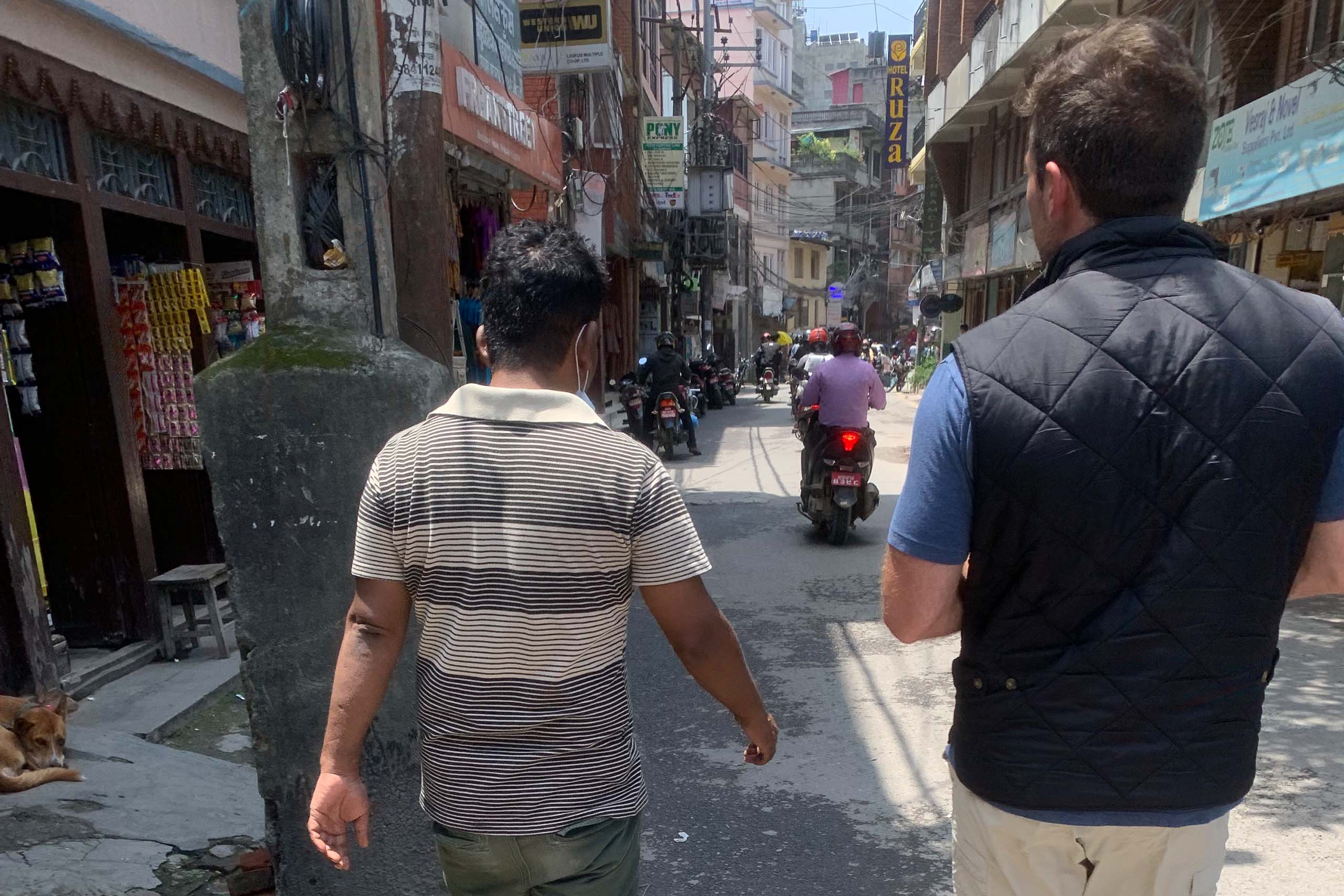 In Kathmandu, where modern amenities are intertwined with historic structures. “History is close in places like Nepal,” Coles says, “in a way that we don’t experience here.”