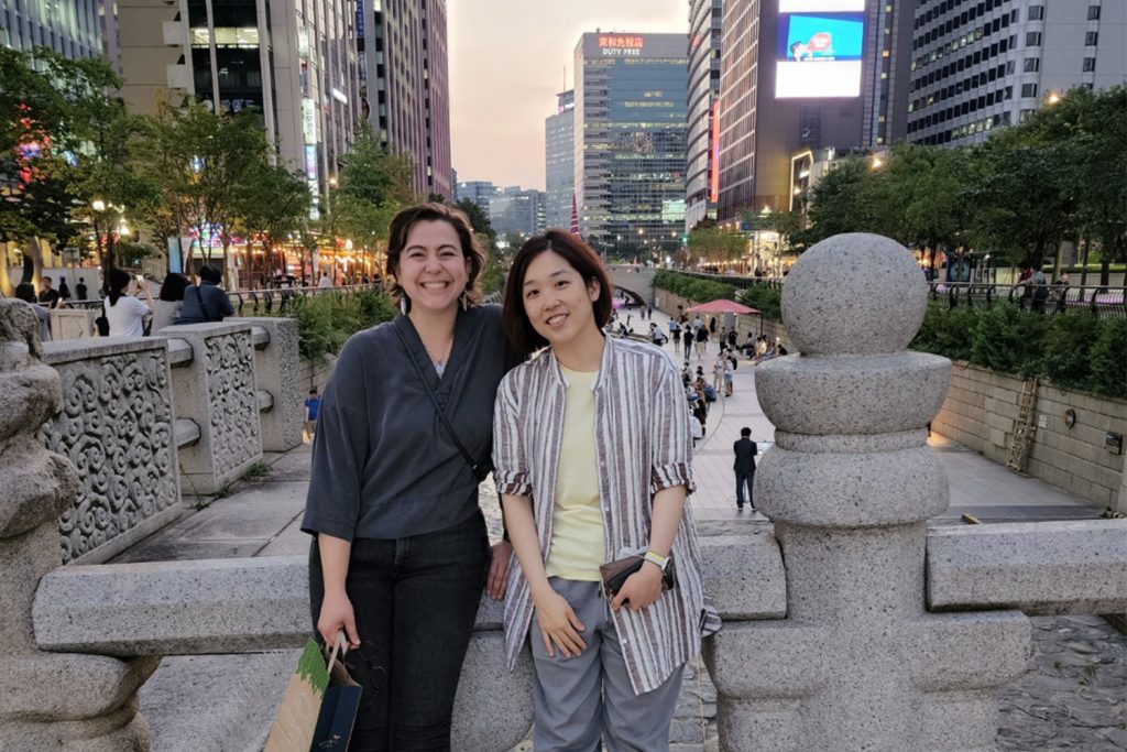 Molly James '23 Ph.D., left, and Hea Youn "Sophy" Chung pose together in August when James visited Seoul, South Korea, as part of a collaboration to turn scientific data into music.